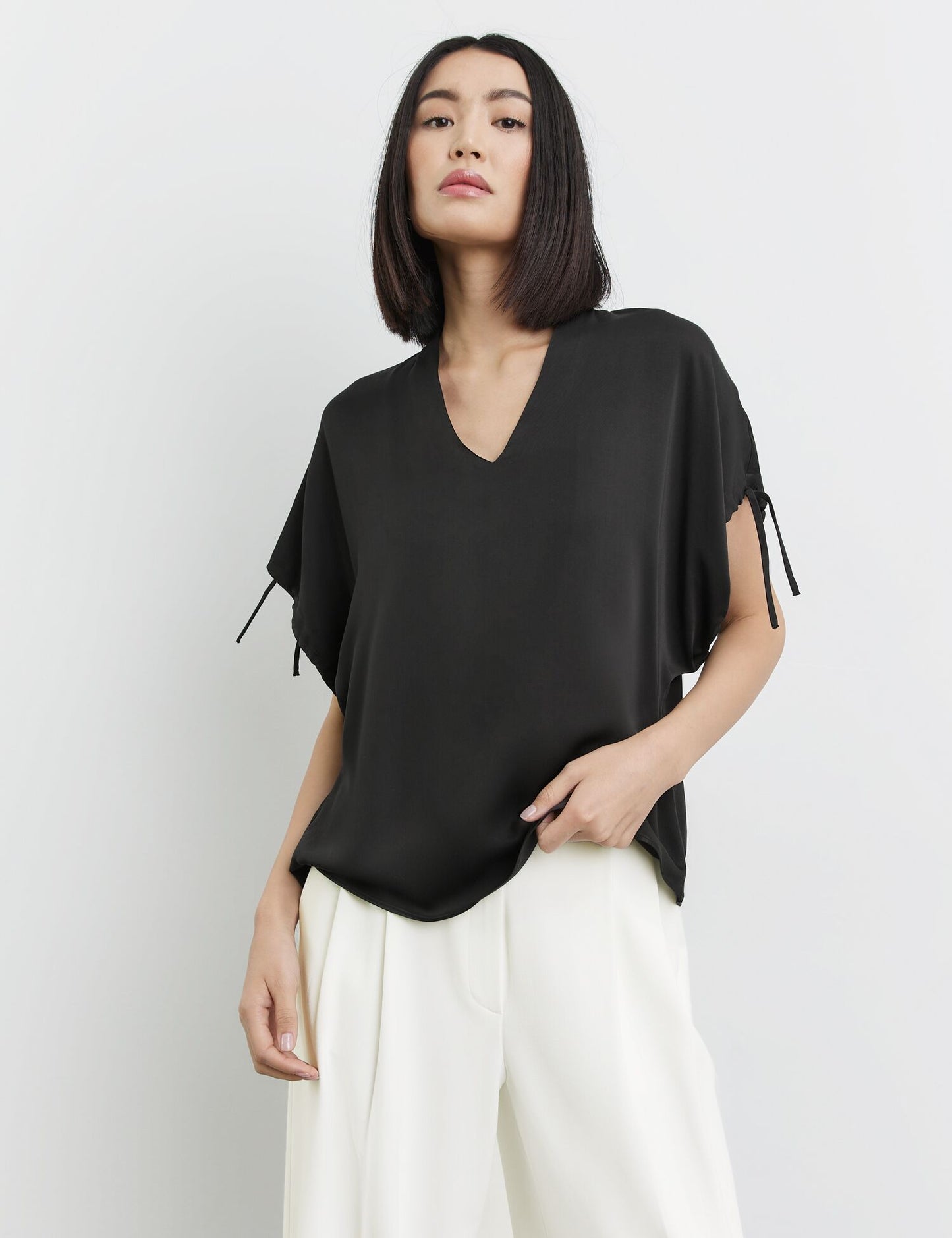 Bluse mit gerafftem Kurzarm